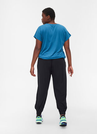 Loose viscose gym trousers, Black, Model image number 1