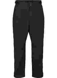 Softshell trousers with adjustable velcro