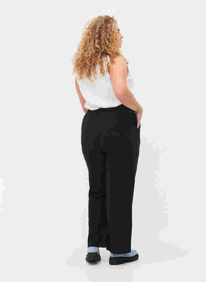 Flared trousers with pockets, Black, Model image number 1