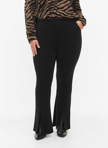 Flared trousers with slits in front, Black, Model image number 2