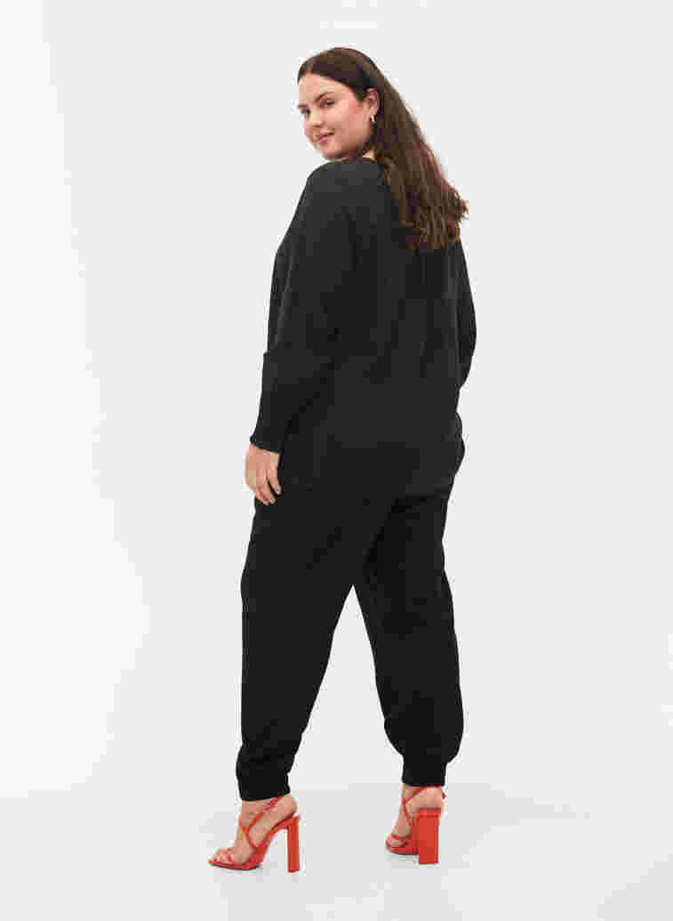 Loose viscose blend trousers with elastic trim, Black, Model image number 1