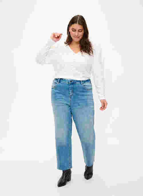 7/8 jeans with raw hems and high waist