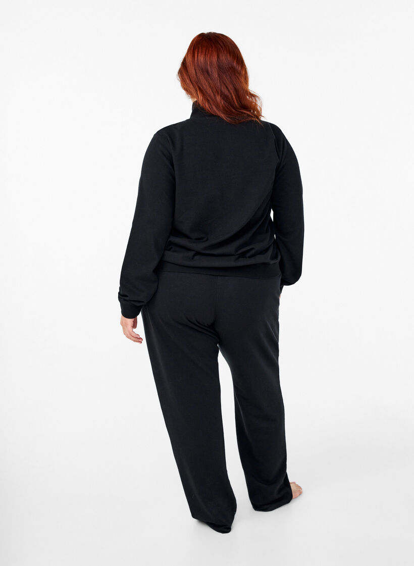 Loose sweatpants with pockets, Black, Model image number 1