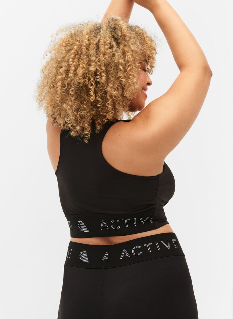 Sports bra with cross detail, Black, Model image number 1