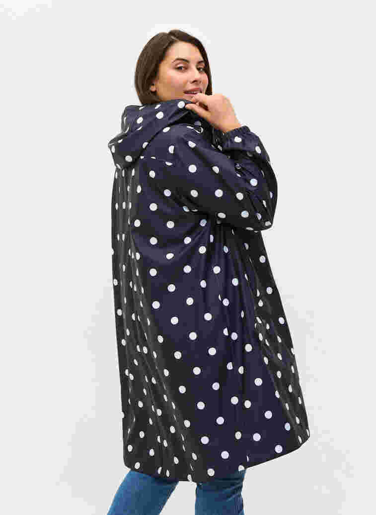 Patterned rain jacket with a hood, Navy Blazer W/Dots, Model image number 1