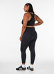 Training tights with a high waist and pocket in the waistband, Black, Model image number 1