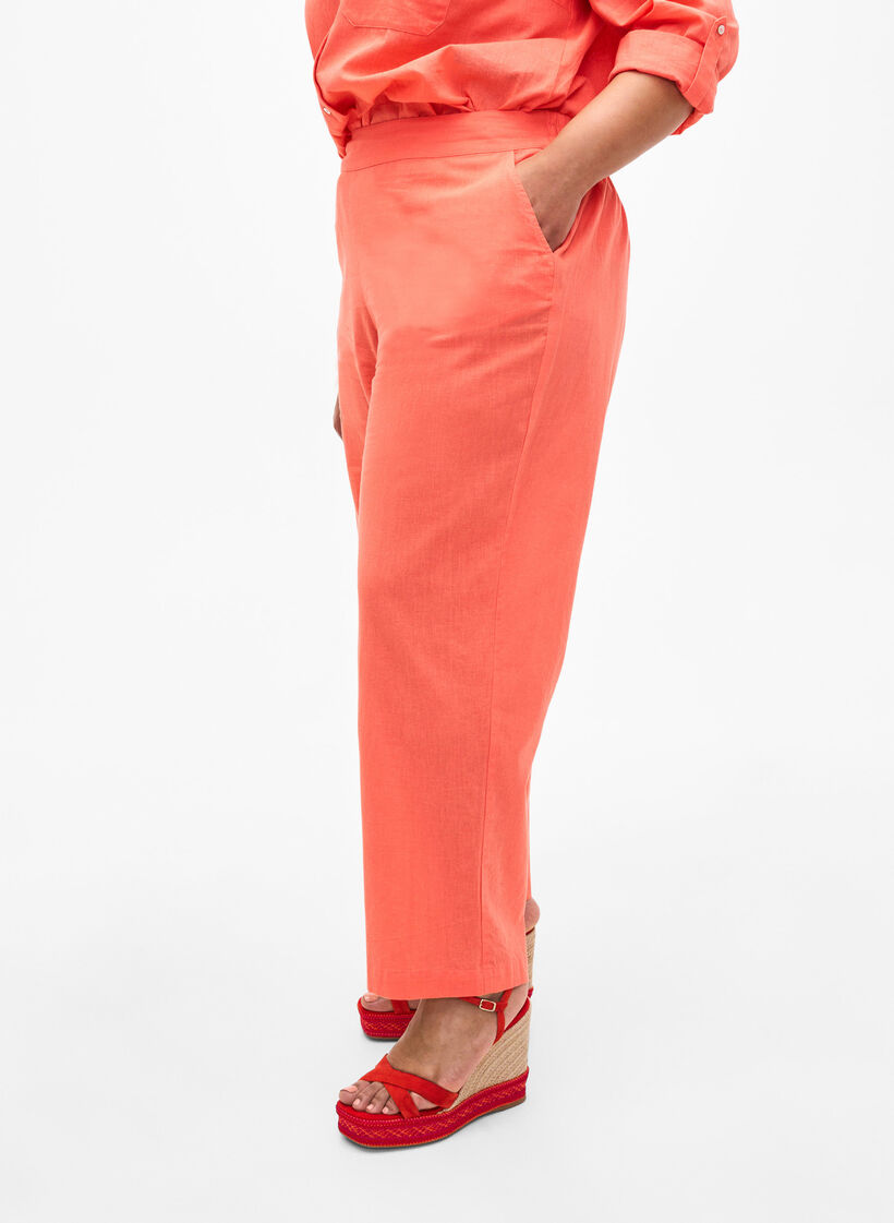 Loose pants in linen-cotton blend, Living Coral, Model image number 2