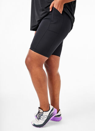Tight-fitting high-waist shorts with pockets, Black, Model image number 0