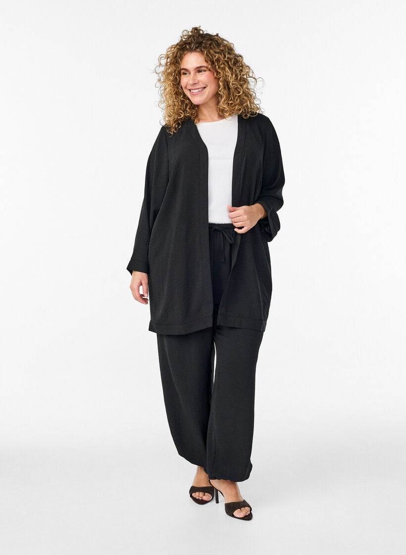 High-waisted balloon trousers, Black, Model image number 0