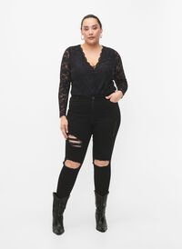 Tight-fitting jeans with rip details, Black, Model