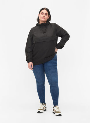 Anorak with hood and pocket, Black, Model image number 2