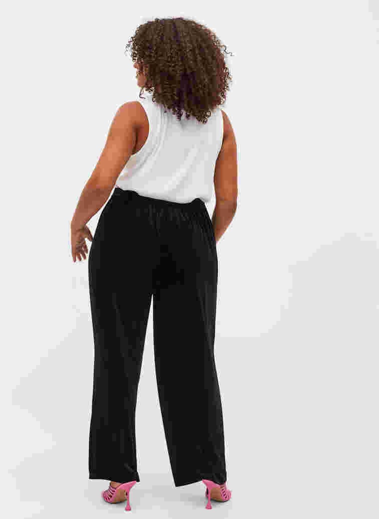 Loose trousers in velour, Black, Model image number 1