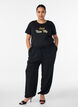 T-shirt with motif, Black, Model image number 1