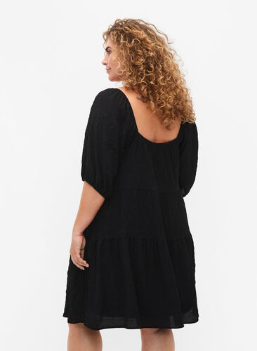 A-shaped short dress with a V-neck, Black, Model image number 1