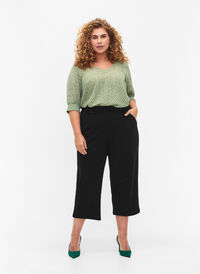 Ankle length trousers with loose fit, Black, Model