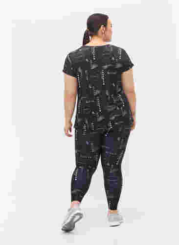 Printed cropped workout tights, Logo AOP, Model image number 1