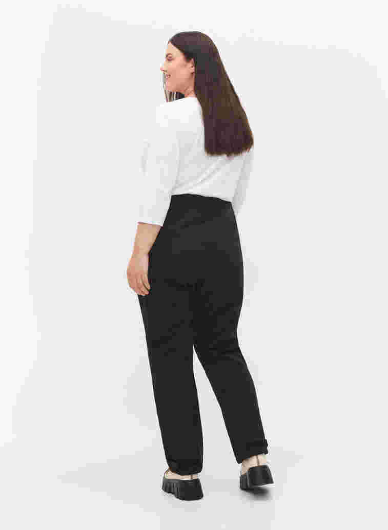 Softshell trousers with adjustable velcro, Black, Model image number 2