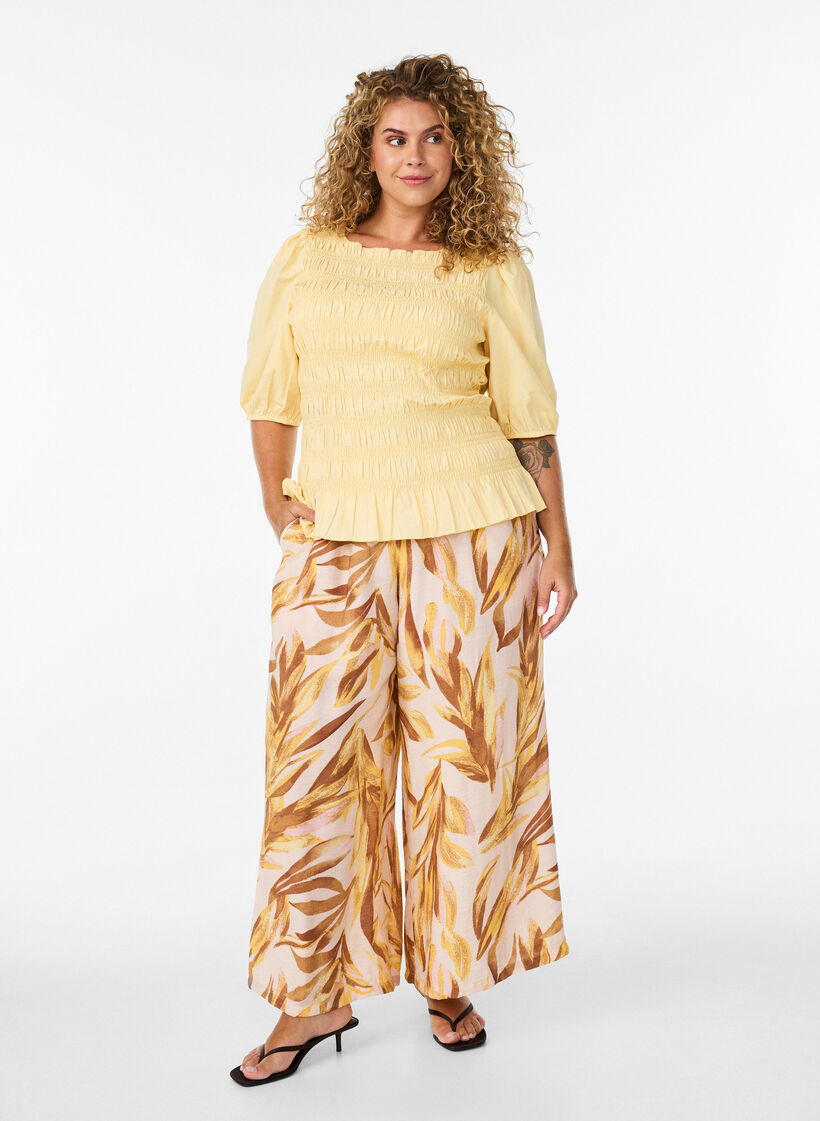 Wide-leg trousers with leaf print and a high elasticated waist, Yellow, Model image number 0