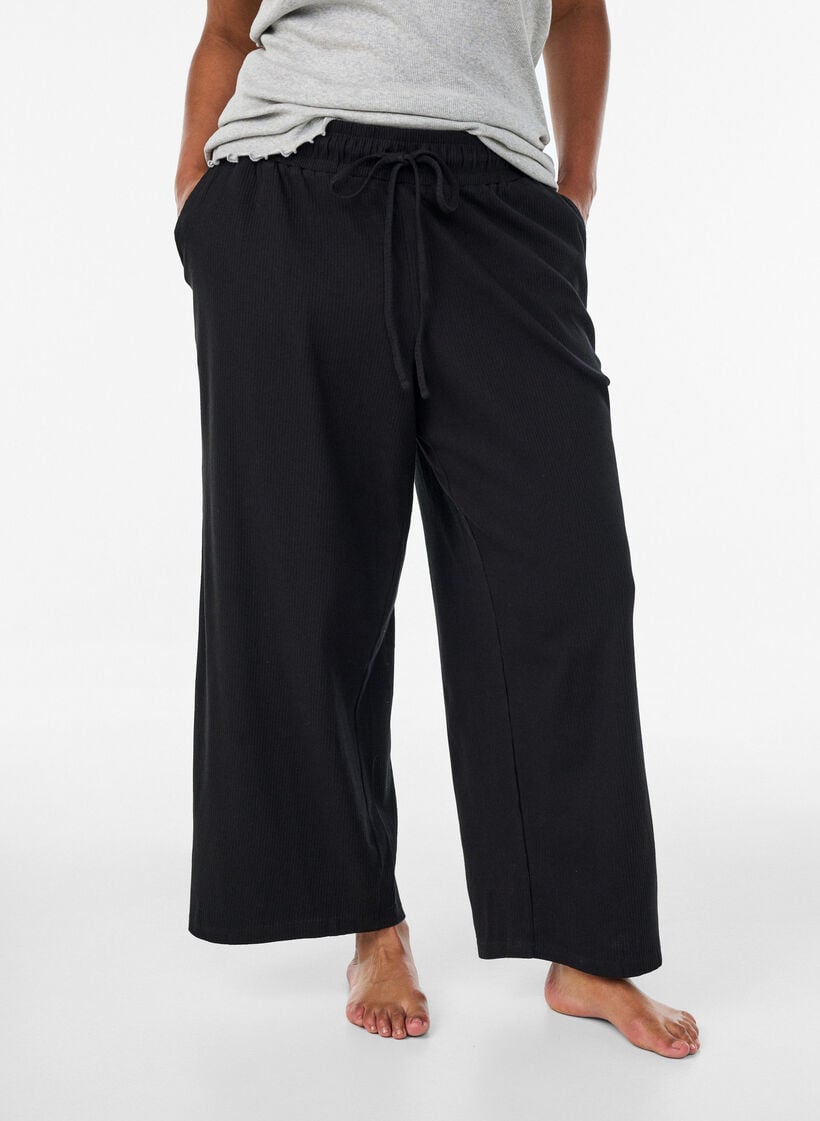 Ribbed pyjama bottoms with straight legs, Black, Model image number 1