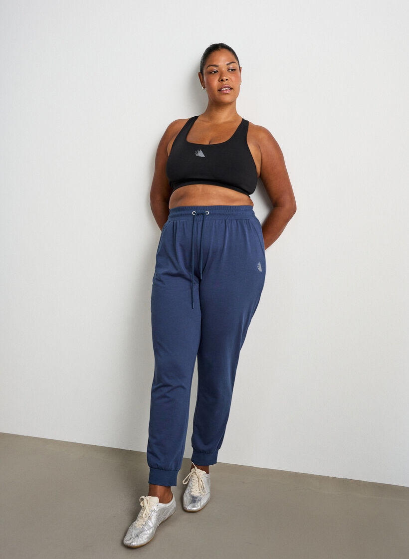 Loose tracksuit trousers with pockets, Blue, Model image number 0