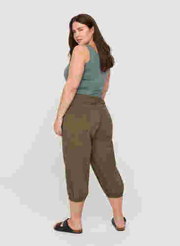 Loose 3/4-length trousers with smock detail, Ivy Green, Model image number 1