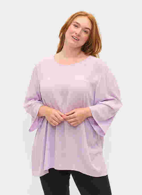 Plain-coloured blouse in 100% viscose