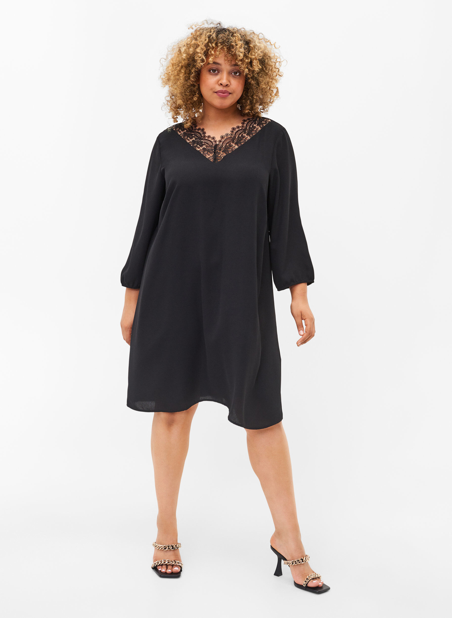 Dress with lace and 3/4 length sleeves 