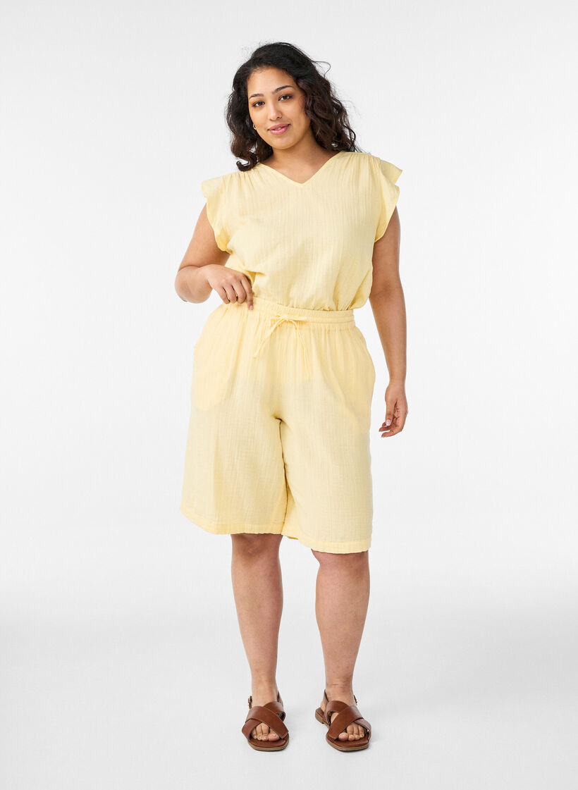 Loose cotton muslin shorts with a high waist, Yellow, Model image number 1