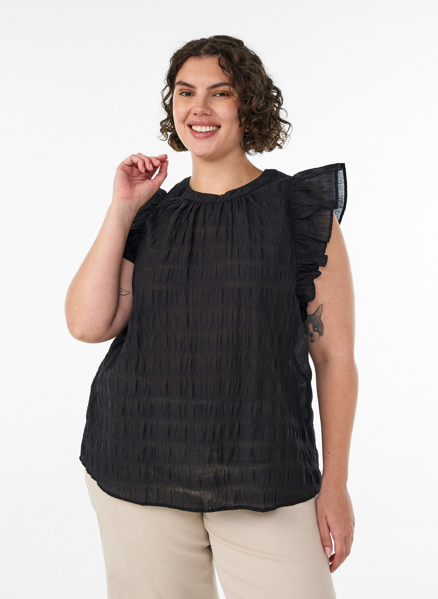 Sleeveless blouse with texture and ruffles, Black, Model