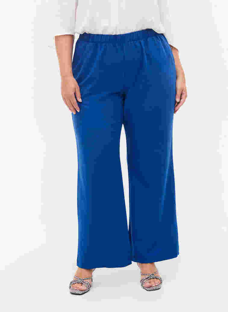 Flared trousers with pockets, Surf the web, Model