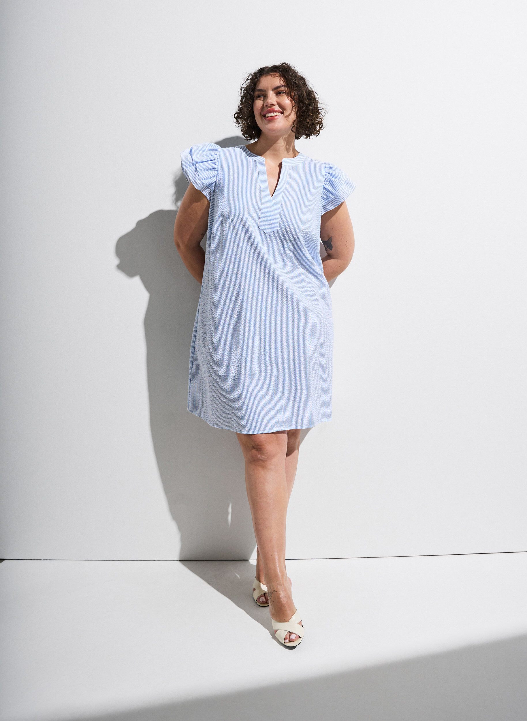 Striped cotton dress with ruffles and an A-line fit