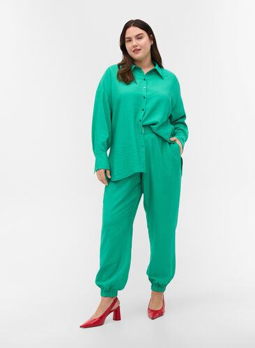 Loose viscose trousers with elastic borders and pockets, Mint, Model image number 0