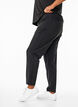 Lightweight training trousers with pockets, Black, Model image number 0