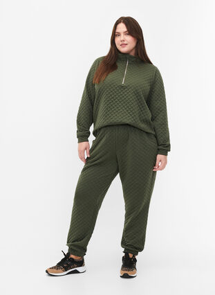 Quilted jogging bottoms with pockets, Thyme, Model image number 0