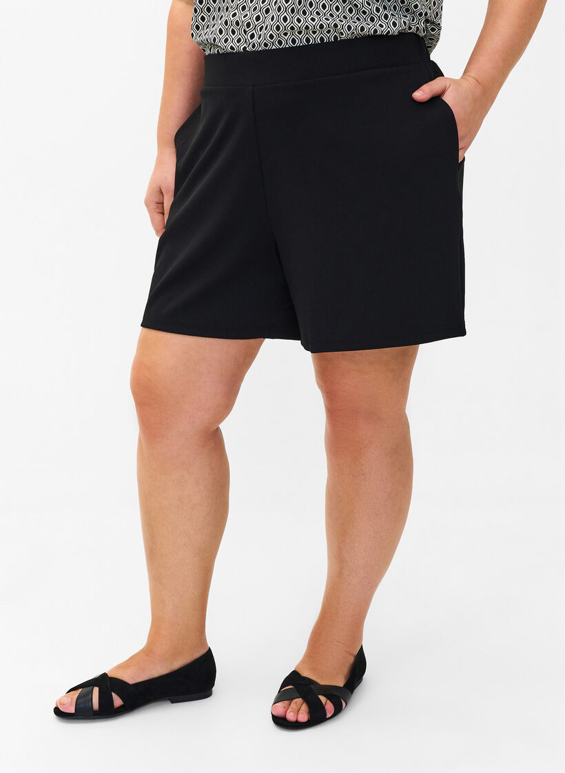 Loose shorts with pockets, Black, Model image number 3