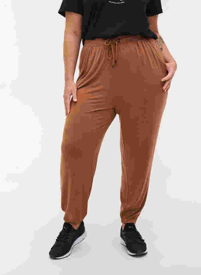 Loose viscose trousers with pockets, Rawhide, Model image number 2