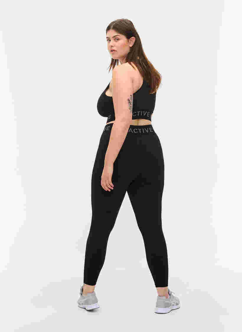 Cropped gym leggings with text print, Black, Model image number 1