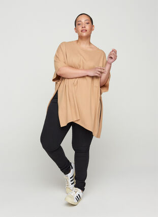 Short-sleeved knitted poncho with round neck, Nomad Mel., Model image number 2