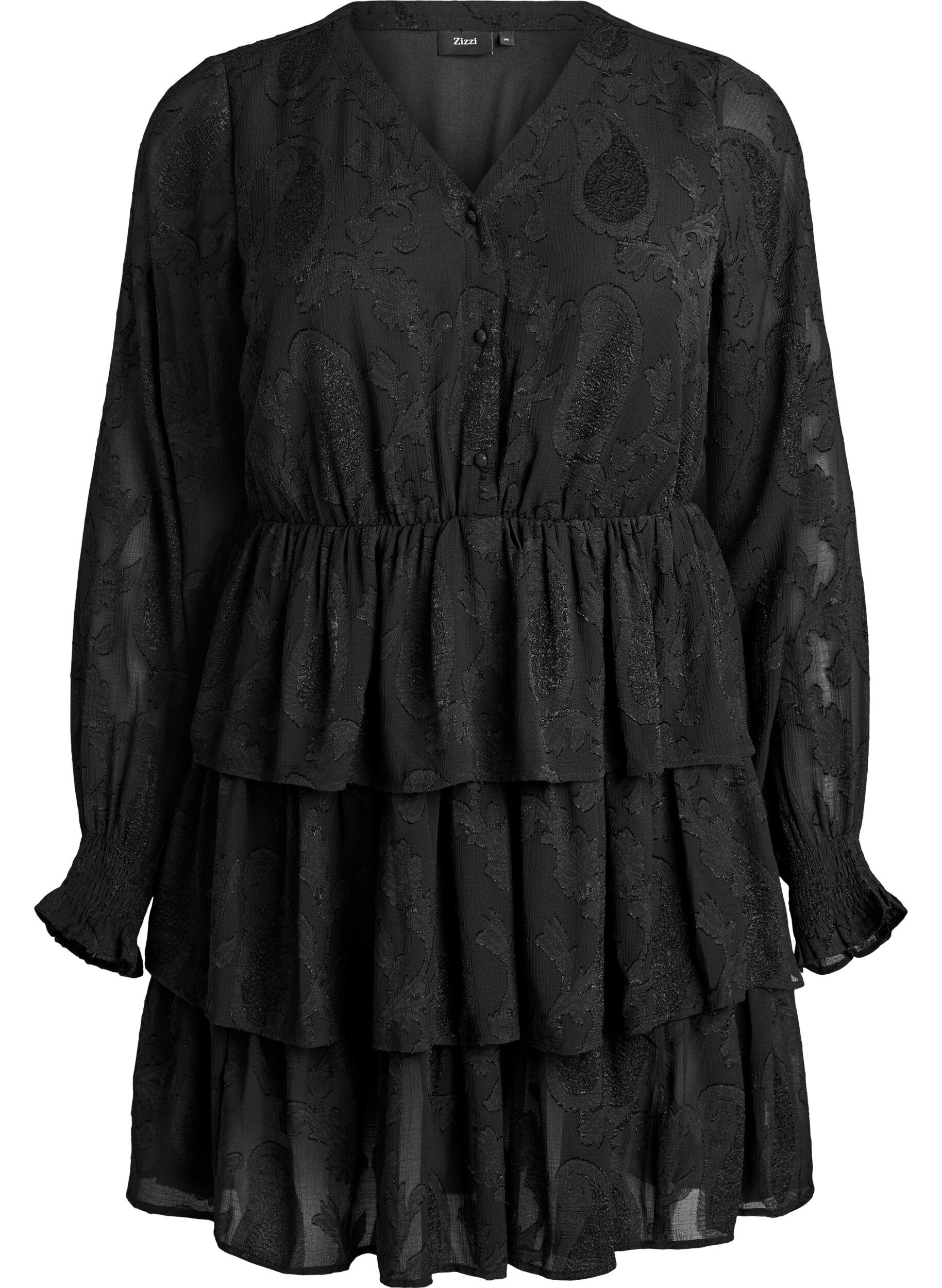 Short dress with ruffles and a textured pattern
