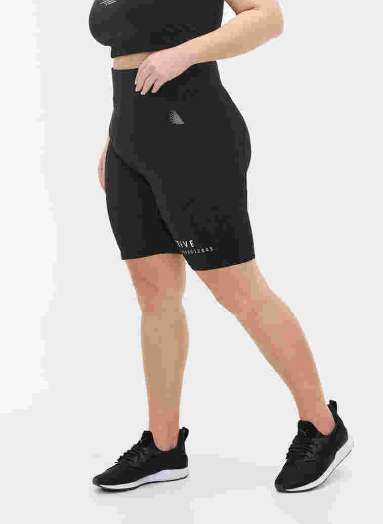 Close-fitting sports shorts with text print, Black, Model image number 2