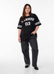Sporty oversized college T-shirt, Black, Model image number 1