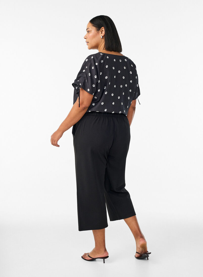 Ankle length trousers with loose fit, Black, Model image number 2