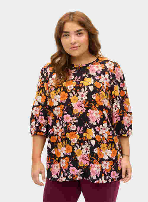 Floral viscose blouse with a back cut-out