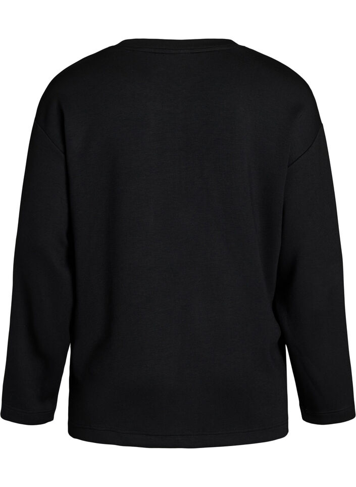Jersey blouse with a diagonal ruffle detail, Black, Packshot image number 1
