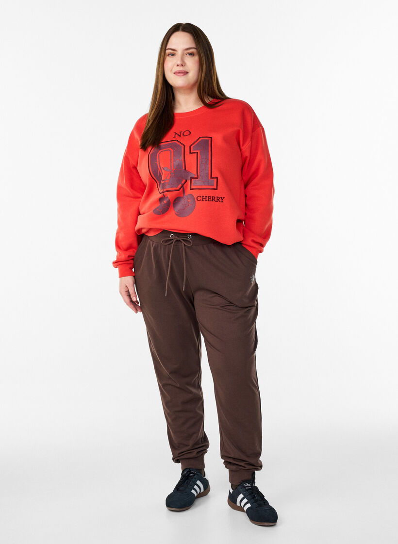 Sweatshirt with front motif, Red, Model image number 1