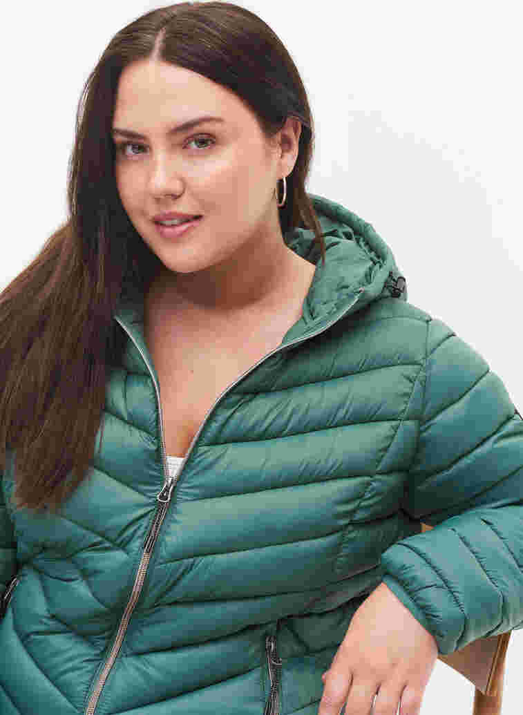 Lightweight jacket with hood, Mallard Green, Model image number 2