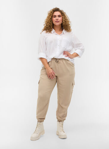 Loose viscose trousers with large pockets, Oxford Tan, Model image number 0