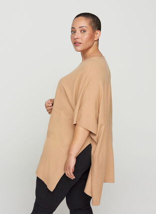 Short-sleeved knitted poncho with round neck, Nomad Mel., Model image number 1