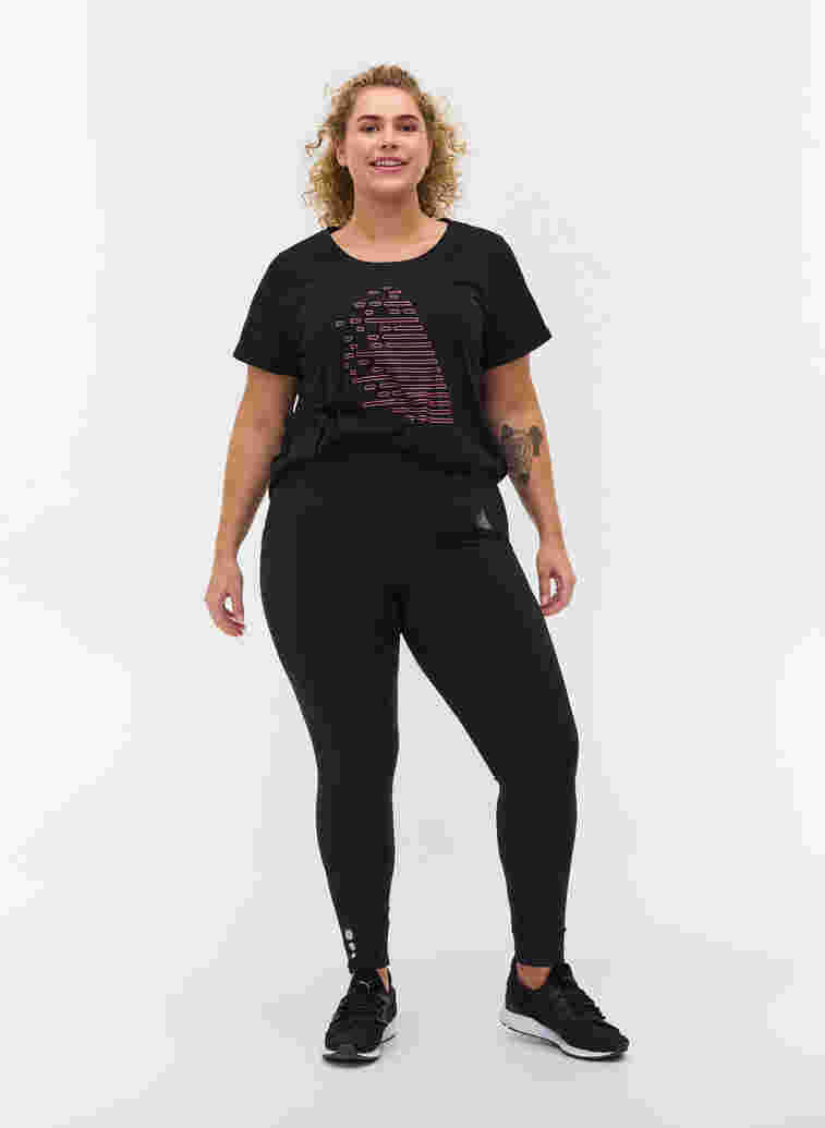 Cropped gym leggings with pocket and reflection, Black, Model