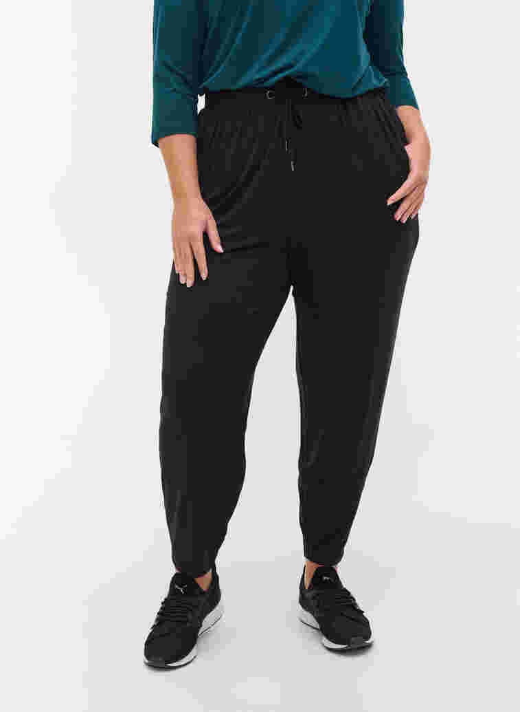 Loose viscose trousers with pockets, Black, Model image number 2
